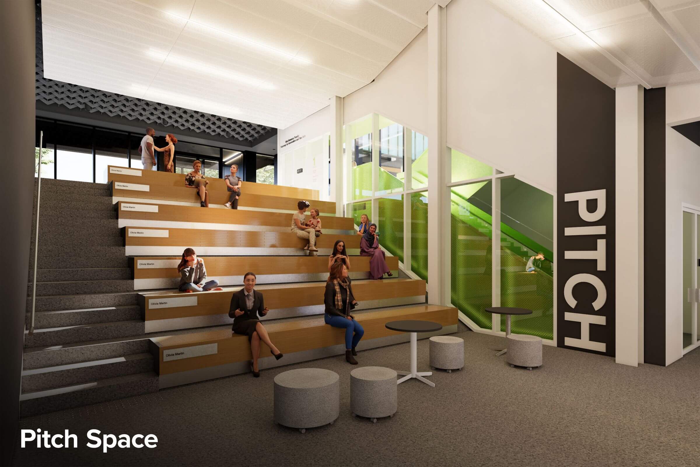 A modern, open indoor space with tiered wooden seating, small round tables, and stools. Several people sit or work on laptops. "PITCH" is written on a wall beside green stairs. The area is labeled "Pitch Space.