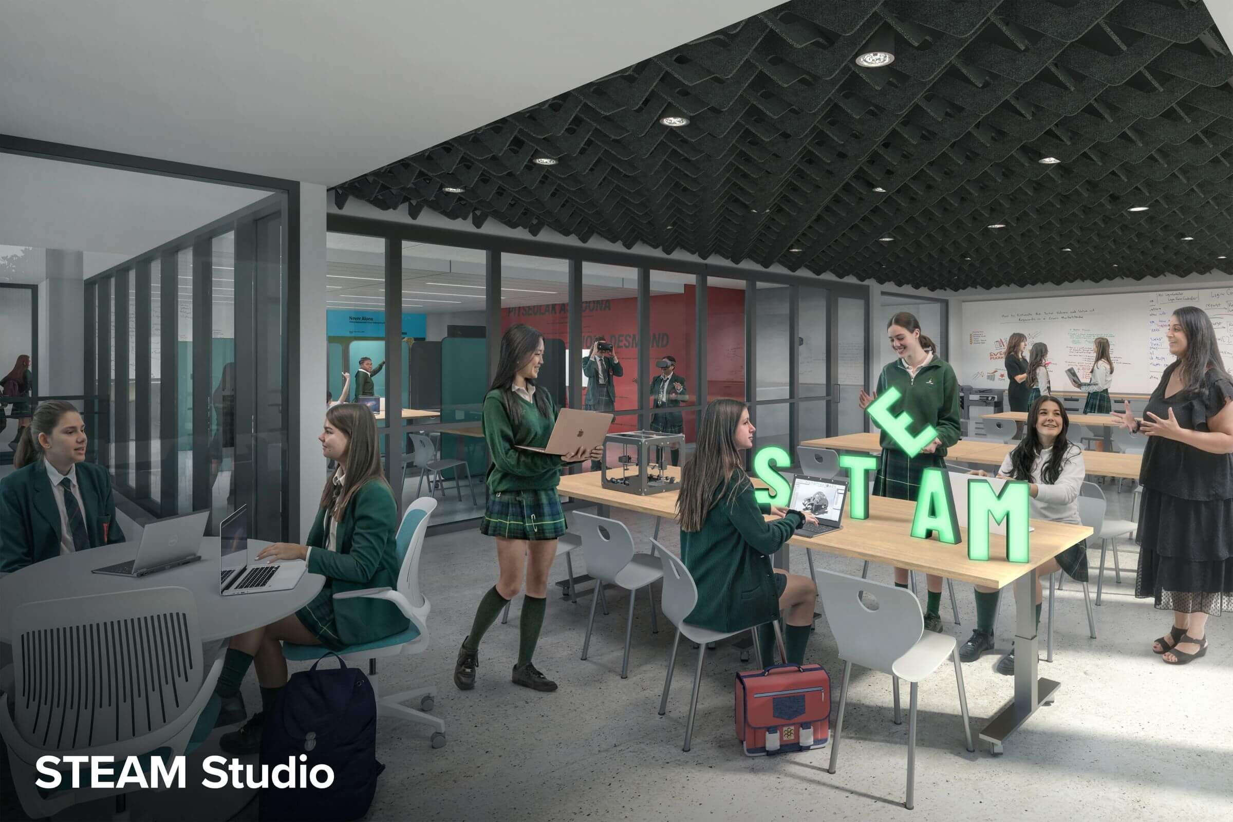Students in school uniforms work together in a modern classroom labeled “STEAM Studio,” using laptops and arranging large letters spelling “STEAM” on tables, with glass walls and collaborative spaces in the background.