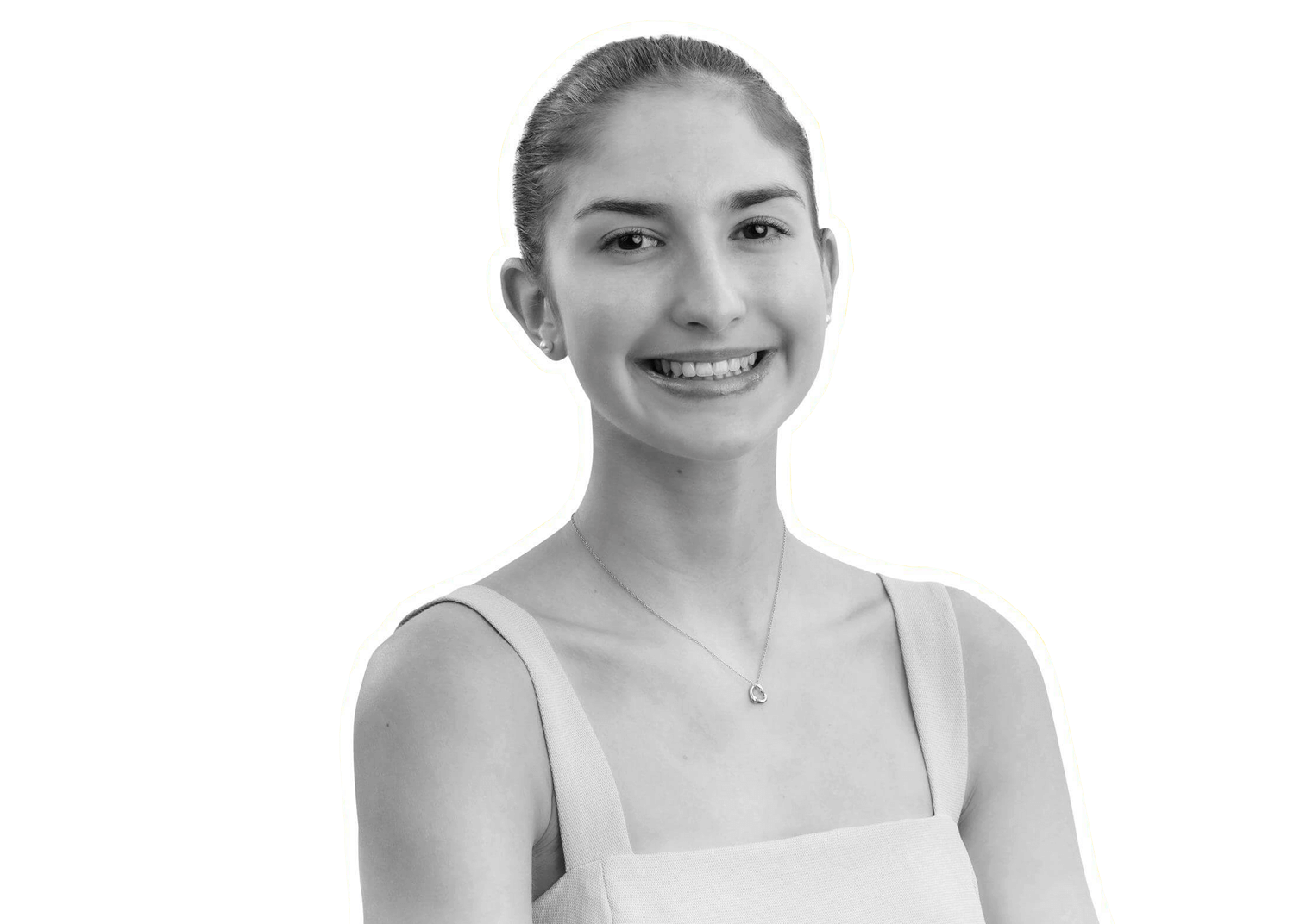 A young woman with pulled-back hair, wearing a sleeveless top and a necklace, smiles at the camera against a plain background. The image is in black and white with a white outline around her.