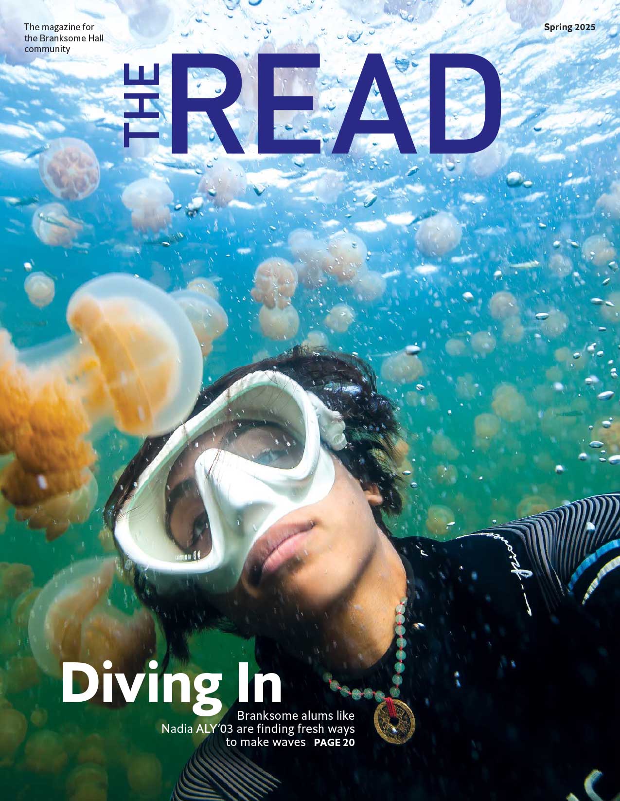 A person wearing a snorkel mask swims underwater among jellyfish, with bubbles rising around them. The magazine title "THE READ" and the headline "Diving In" appear on the image.