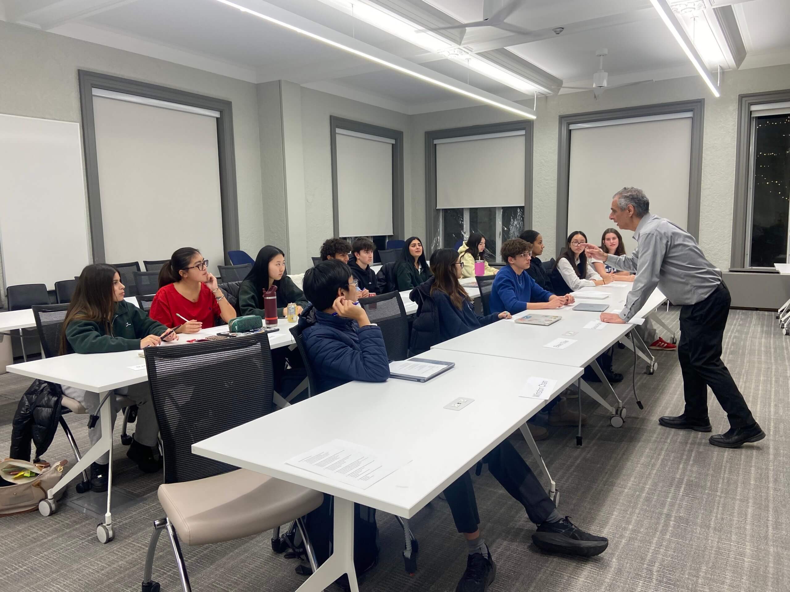 Guest speaker gives a presentation to slingshot students